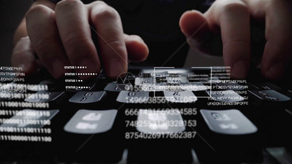 从事膝上型计算机键盘工作的男子该键盘配有图形用户界面全息图显示大数据科技字网络连接和计算机编程法的概念